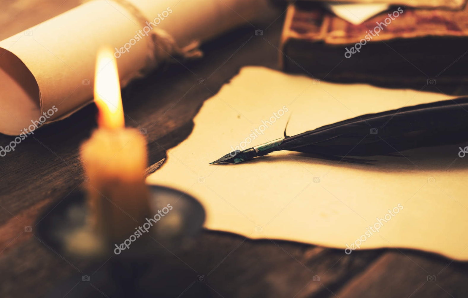 writing letter in candlelight. vintage items on the table